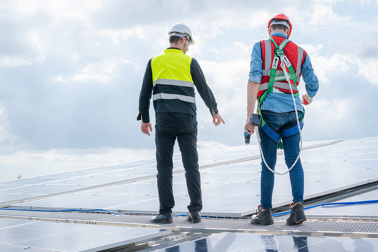 Roofing contractors discussing repair plans