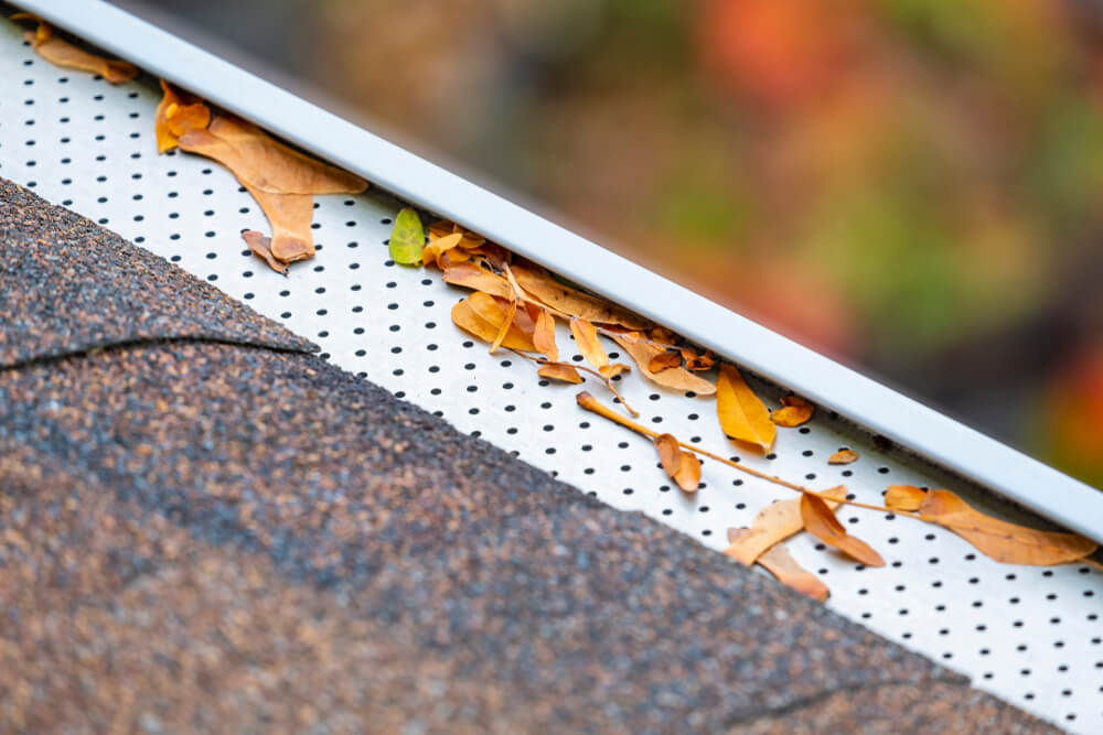 Closeup of gutter guards | prevent leaves and debris in gutters