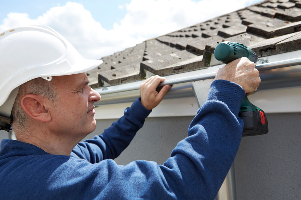 Eavestrough installation in Calgary 2025 | aluminum gutter system on house