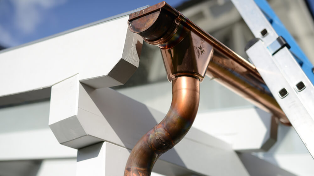 Home exterior with copper gutters | premium materials for long-term durability